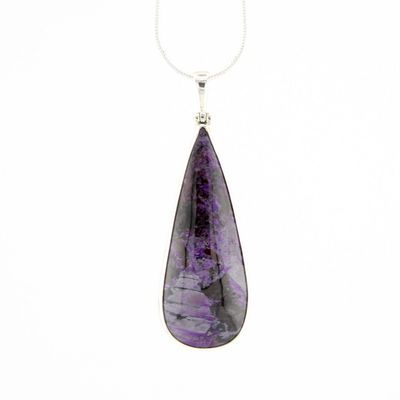 Teardrop-shaped purple stone pendant on a white background