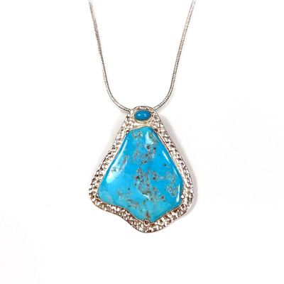 Arizona Rough Turquoise Pendant set in Hammered Silver with Turquoise Cabochon.
